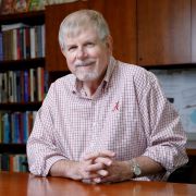 Dr. David Dixon sitting at his desk at University of Alabama