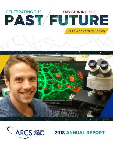 Picture of the front cover of the Annual Report Celebrating the Past, Envisioning the Future. Picture includes a smiling man in front of a workstation in a laboratory